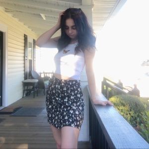 Adorable black button-up floral skirt